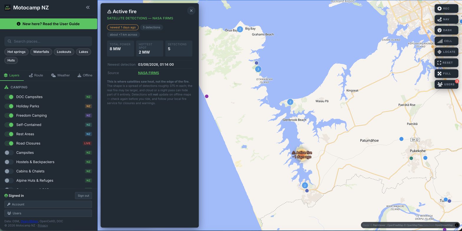 An active fire on the Manukau Harbour near Waiuku, south of Auckland, marked Active fire &middot; 1 days ago on the map, with a card open showing 5 satellite detections, 8MW of total power, a 2MW hottest spot and a spread of under a kilometre.